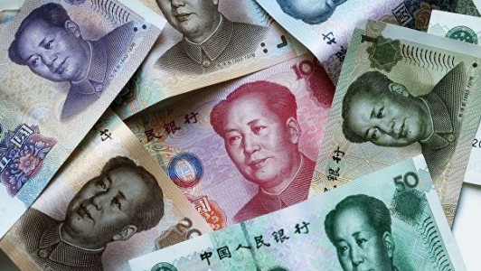 Народный банк Китая ослабил курс юаня к доллару